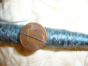 Gale's Fiber Art Tussah Silk spun on a Trindle